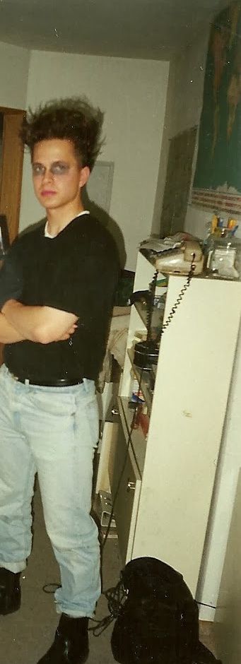 David Gailey as a teenager, dressed in black with backcombed hair